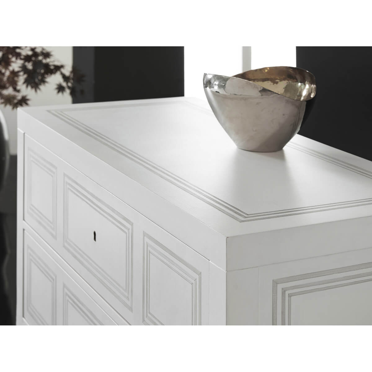 Close-up of decorative top on Neo Classic chest.