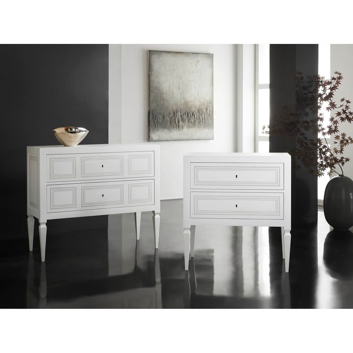 Two matching Italian Neo Classic chests in stylish decor.