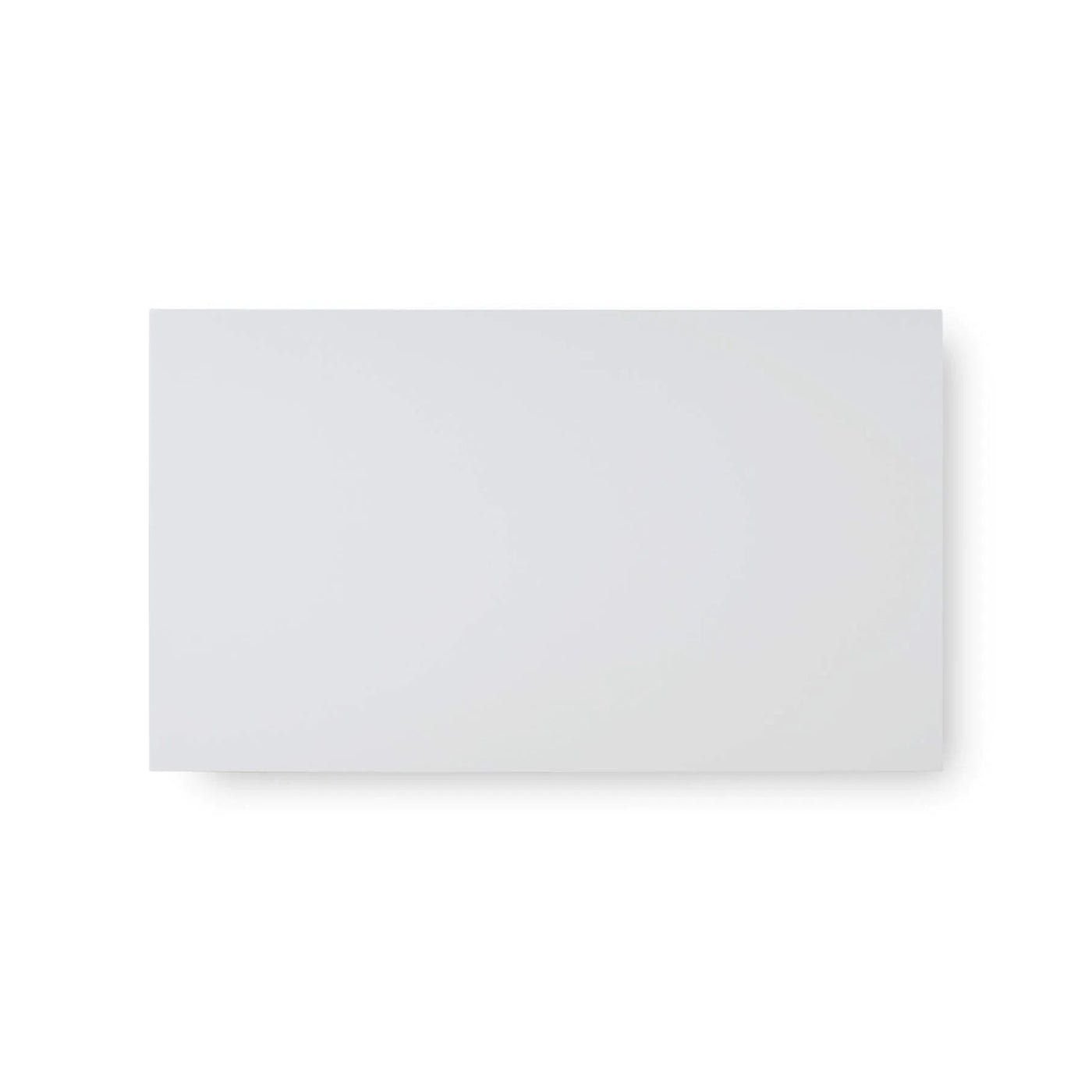 Top view of rectangular white coffee table.