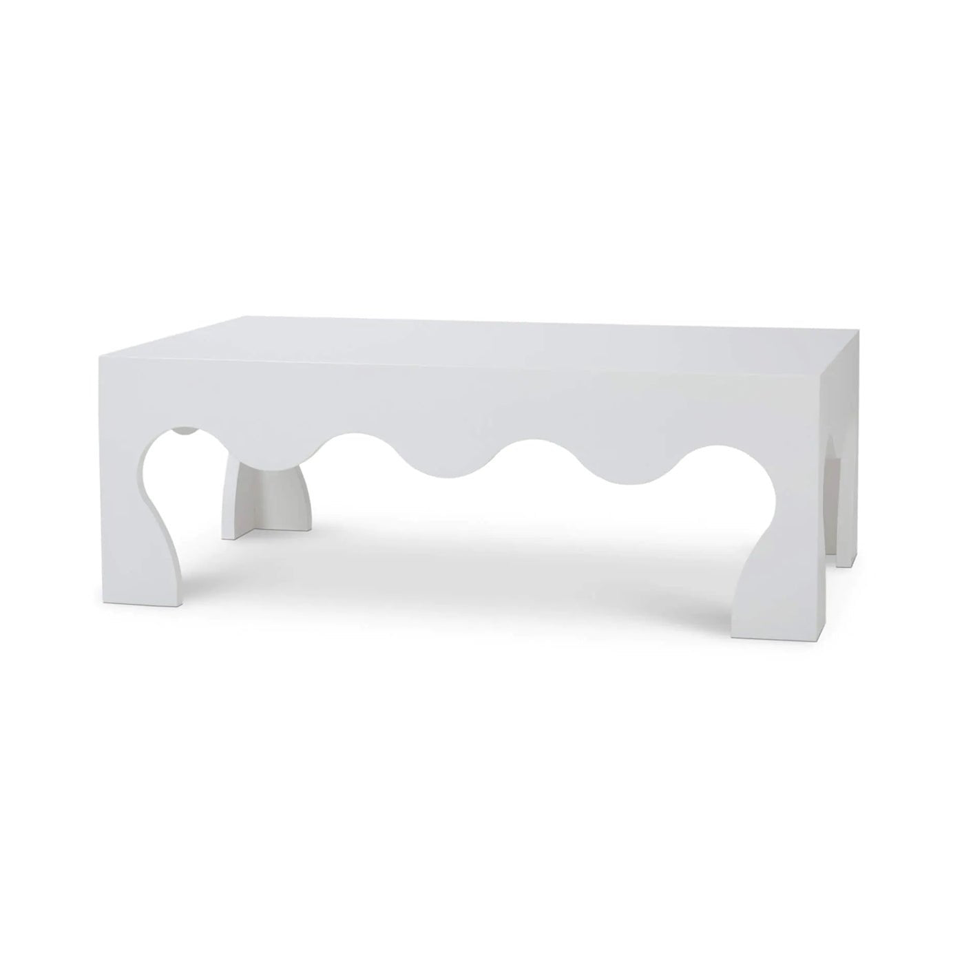 White modern coffee table with wavy cutout design.