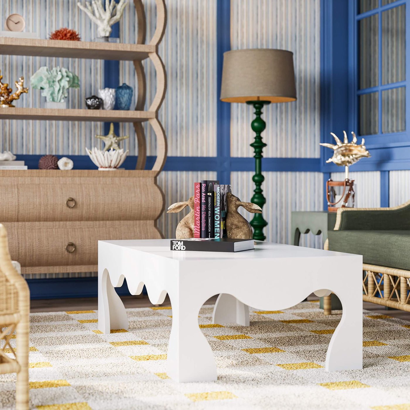 Styled coffee table with books in modern living room.
