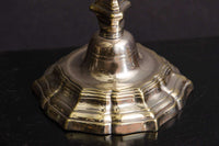 Close-up of candlestick base detail, Louis XIV style.