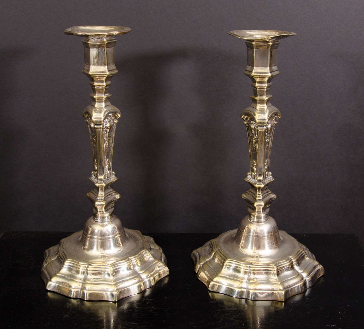 Pair of Louis XIV candlesticks, side-by-side view.