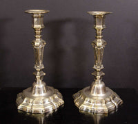 Pair of Louis XIV candlesticks, side-by-side view.