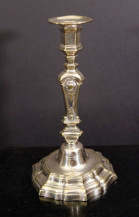 Single Louis XIV silvered bronze candlestick, left profile.