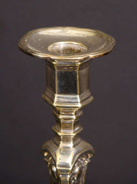 Top of Louis XIV candlestick showing ornate detailing.