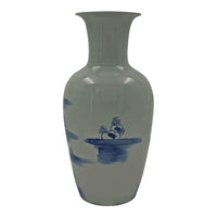 Back of vase with floral motif detail.