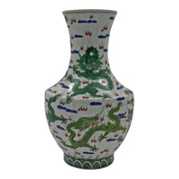 Single green dragon vase, detailed view.