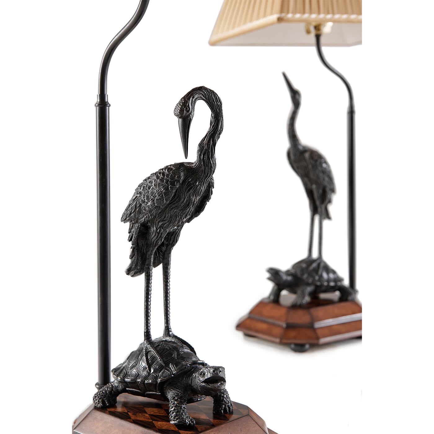 Close-up of crane-on-turtle detail table lamps.