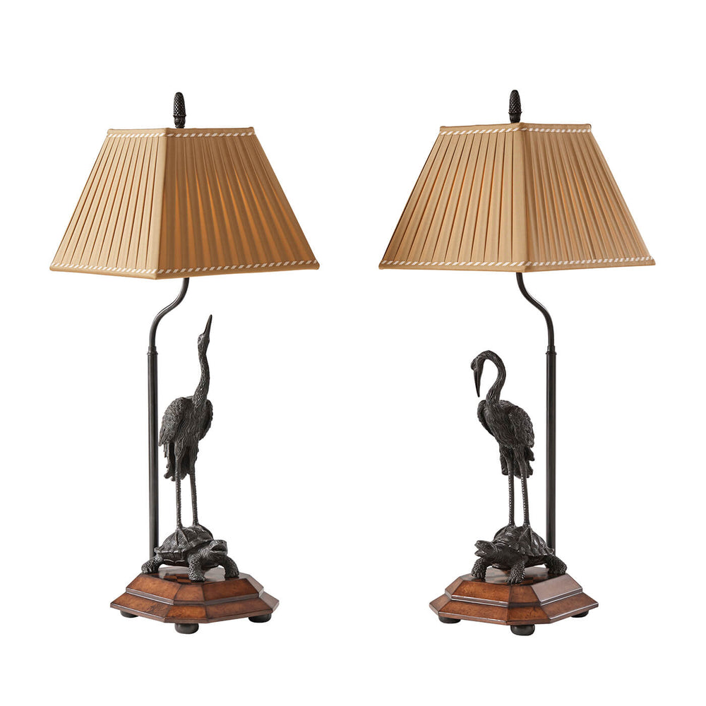 Pair of crane form table lamps front view.