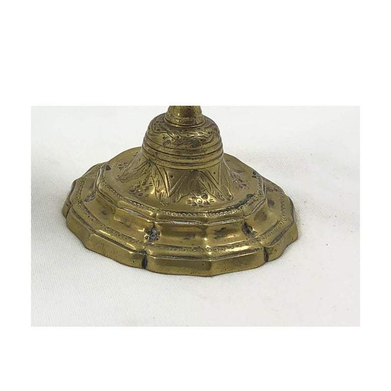 Close-up of intricate base on French candlestick.