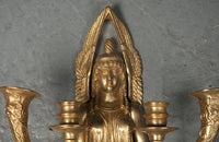 Top view of Empire sconce with elegant winged figure.