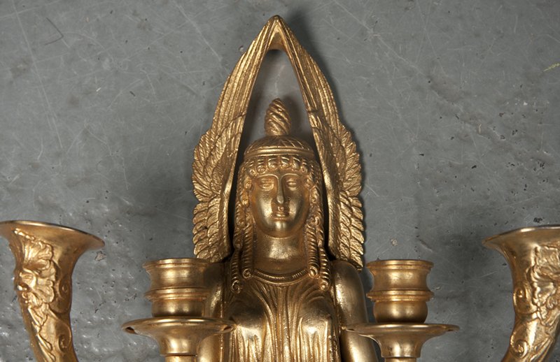 Top view of Empire sconce with elegant winged figure.