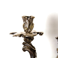 Candle holder detail on French Chinoiserie sconce, floral motif.