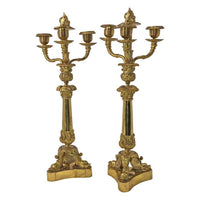 Pair of ornate French Empire candelabra, full view.