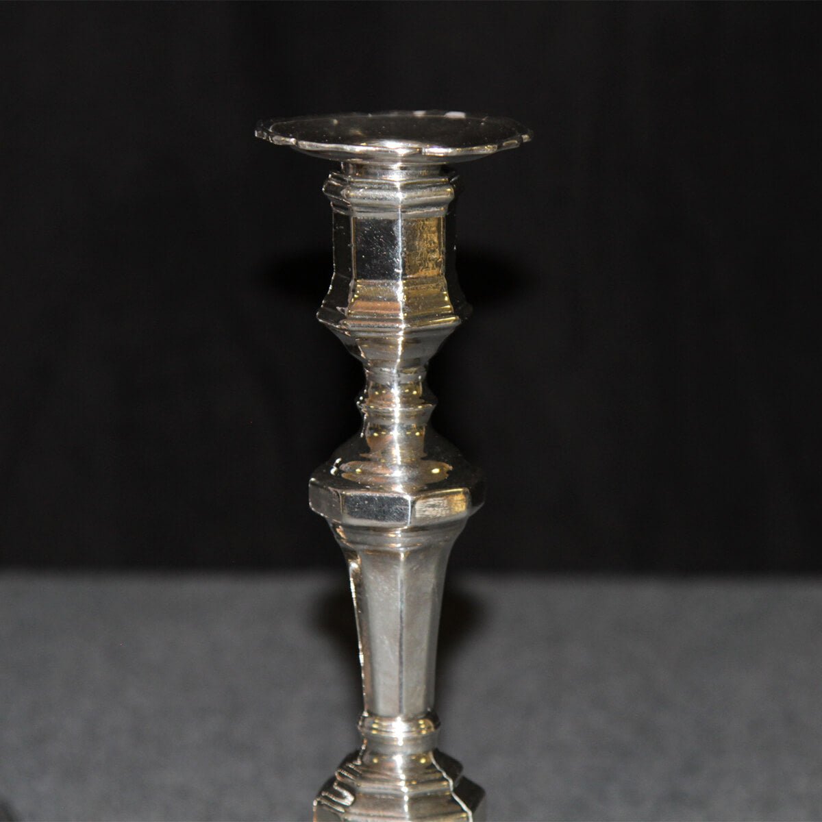 Detailed view of a candlestick top, French style.