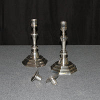 French candlesticks with removable tops, displayed on table.