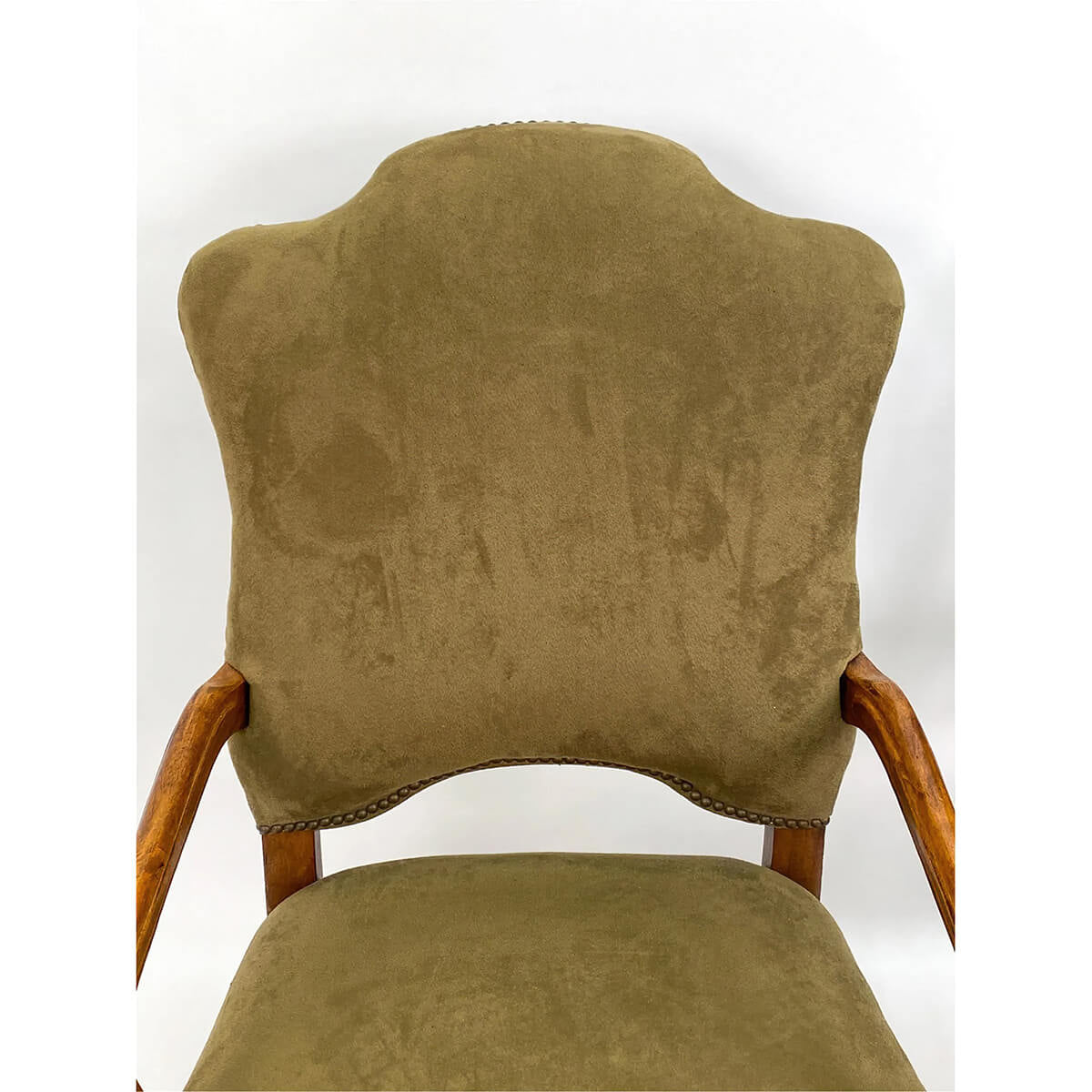Close-up of one armchair backrest.
