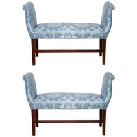 Pair of blue upholstered mahogany benches, front view.