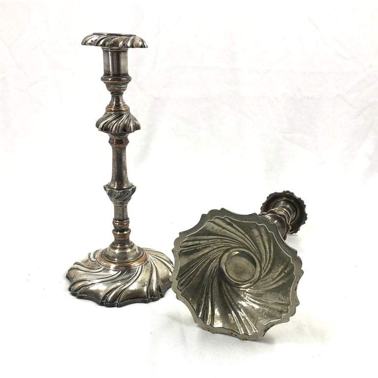 Base and standing view of Georgian candlesticks.