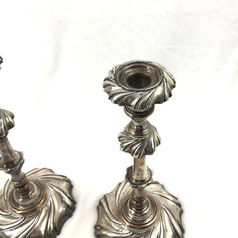 Top view of Georgian silvered candlestick pair.