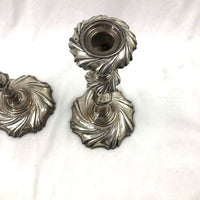 Close-up of Georgian candlestick tops, detailed design.