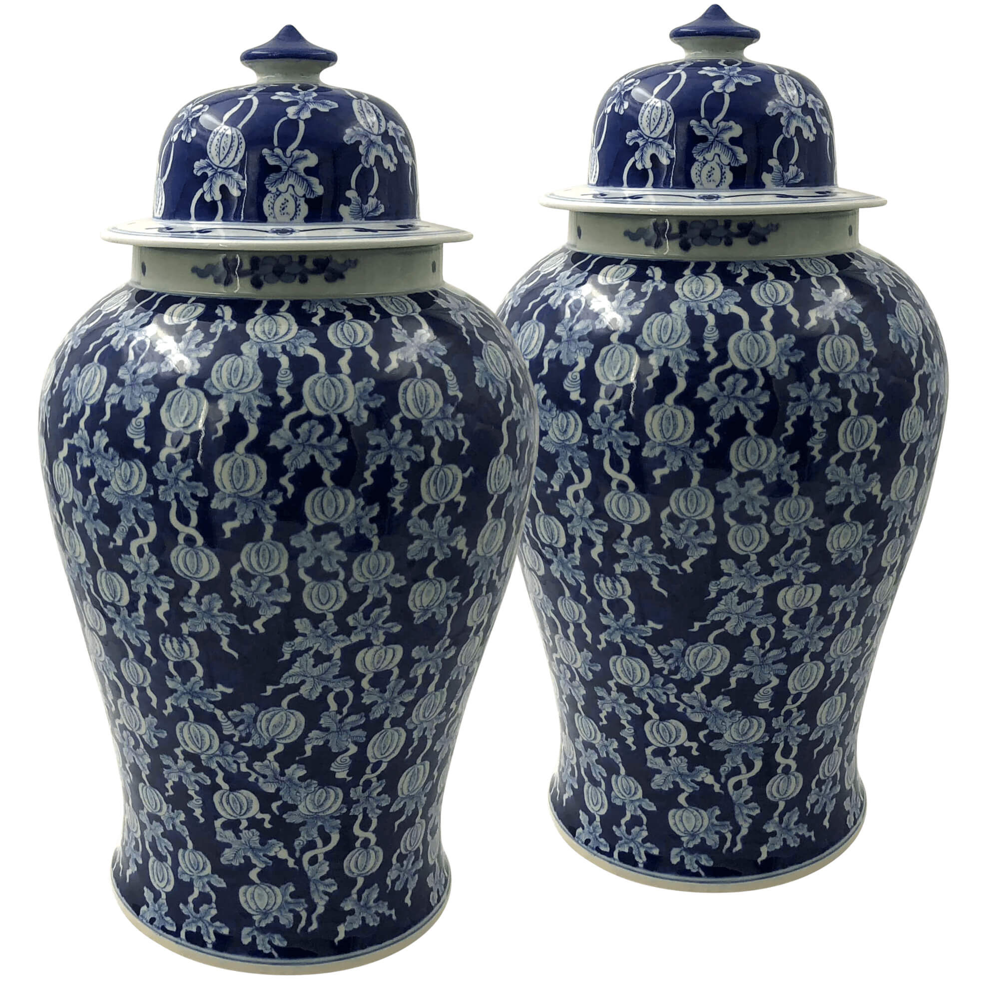 Pair of blue and white ginger jars, full view.