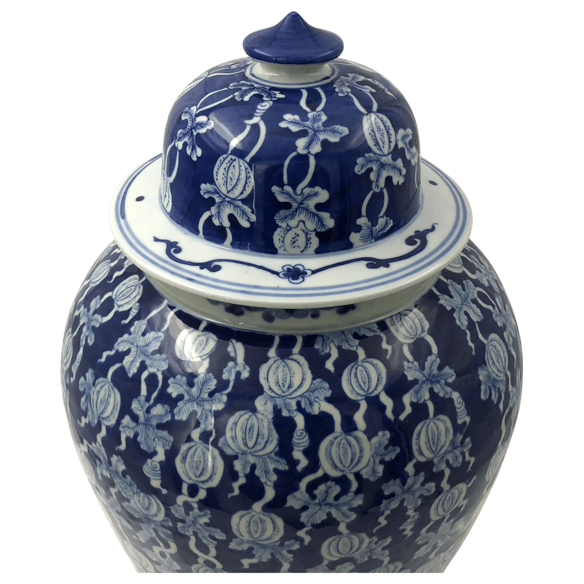 Close-up of ginger jar lid and design details.