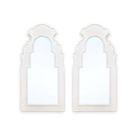 White wall mirrors, ornate design, side by side.