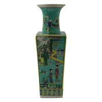 Close-up of vase panel, colorful figures, green background.