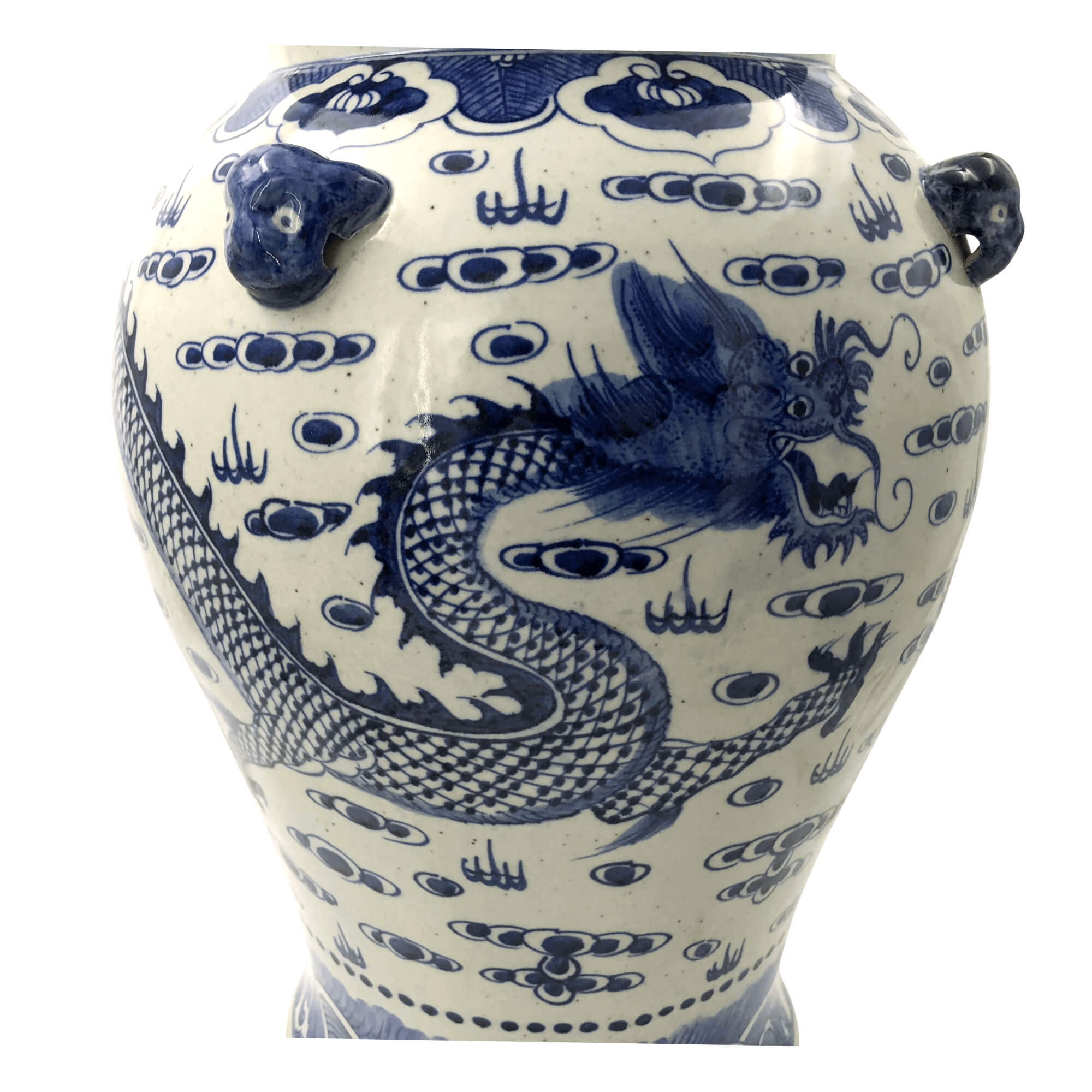 Close-up of dragon design on ginger jar.