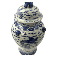 Top view of ginger jar with dragon and lid details.