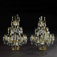 Elegant Louis XIV girandoles, dark background, detailed crystals