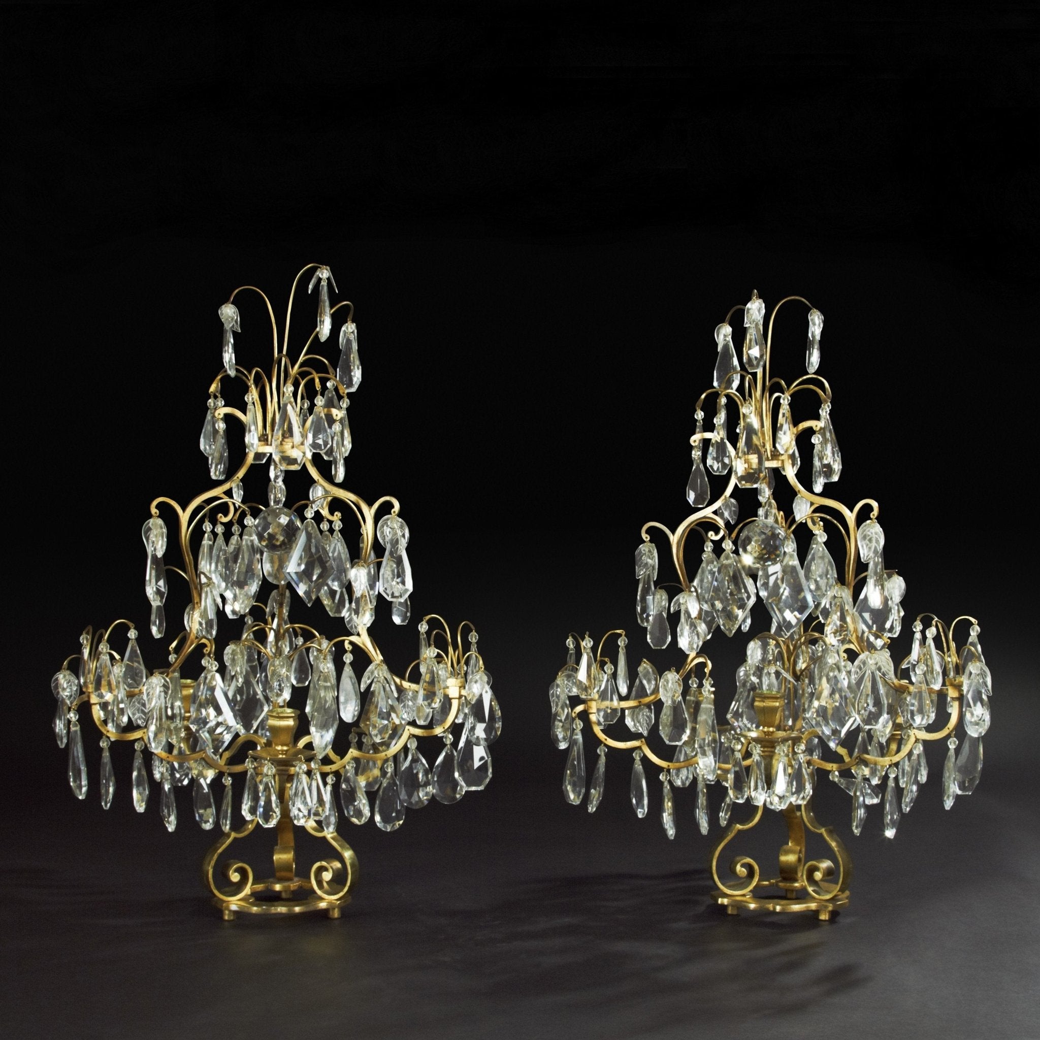 Elegant Louis XIV girandoles, dark background, detailed crystals