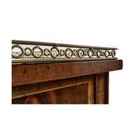 Mahogany bedside cabinet decorative metal railing detail.