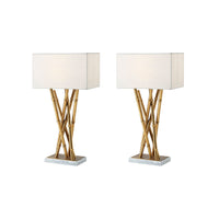 Pair of brass table lamps with white shades.