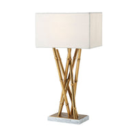 Brass table lamp with marble base for decor.