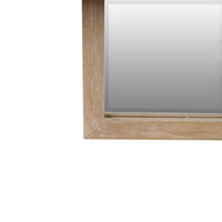 Close-up of bottom wooden frame detailing on mirror.