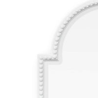 Close-up of Queen Anne mirror's beaded edge design.