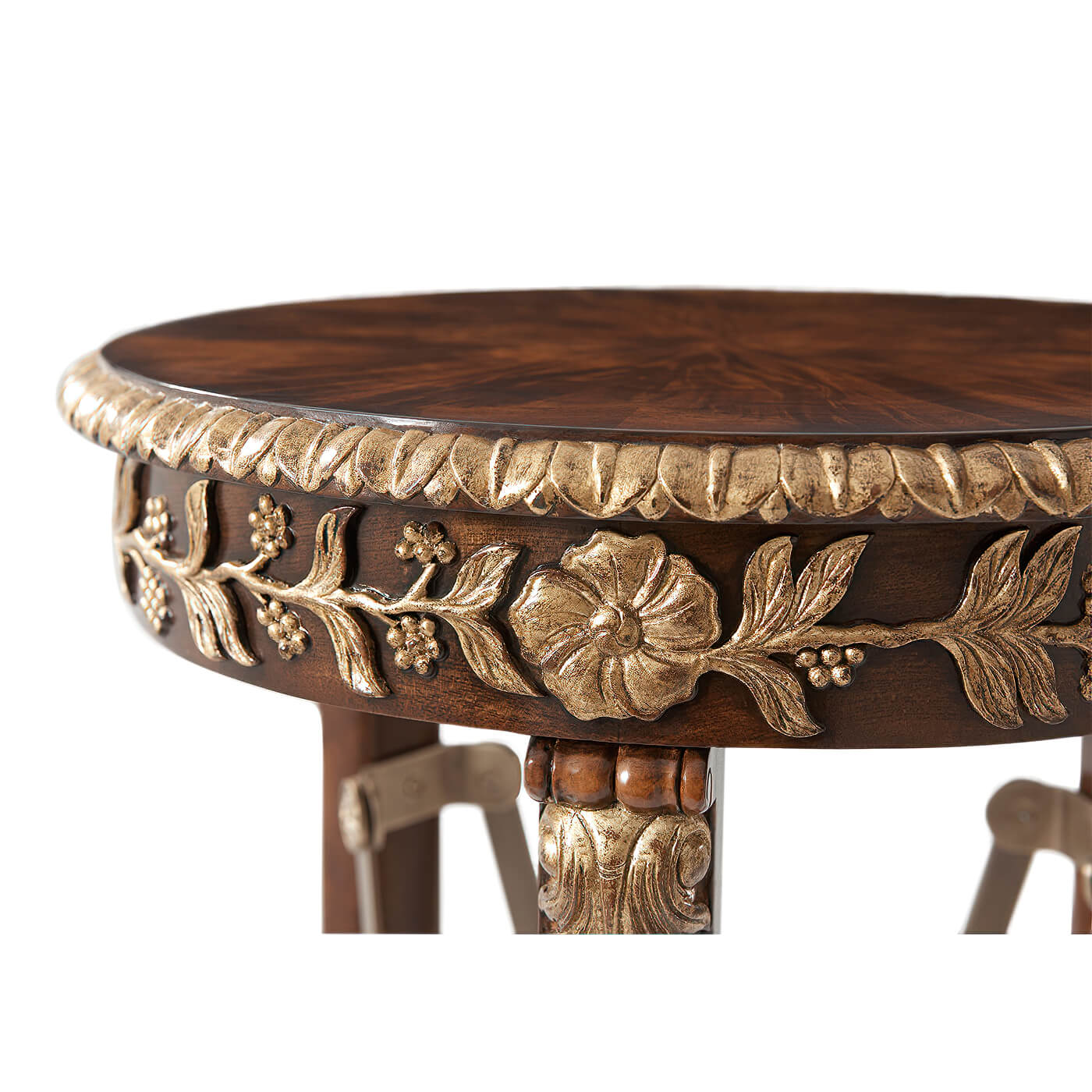 Close-up of regency pedestal top's floral carvings.