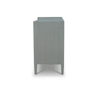 Side view of modern chest of drawers.