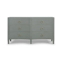 Pale blue dresser front view, gold handles, closed drawers.