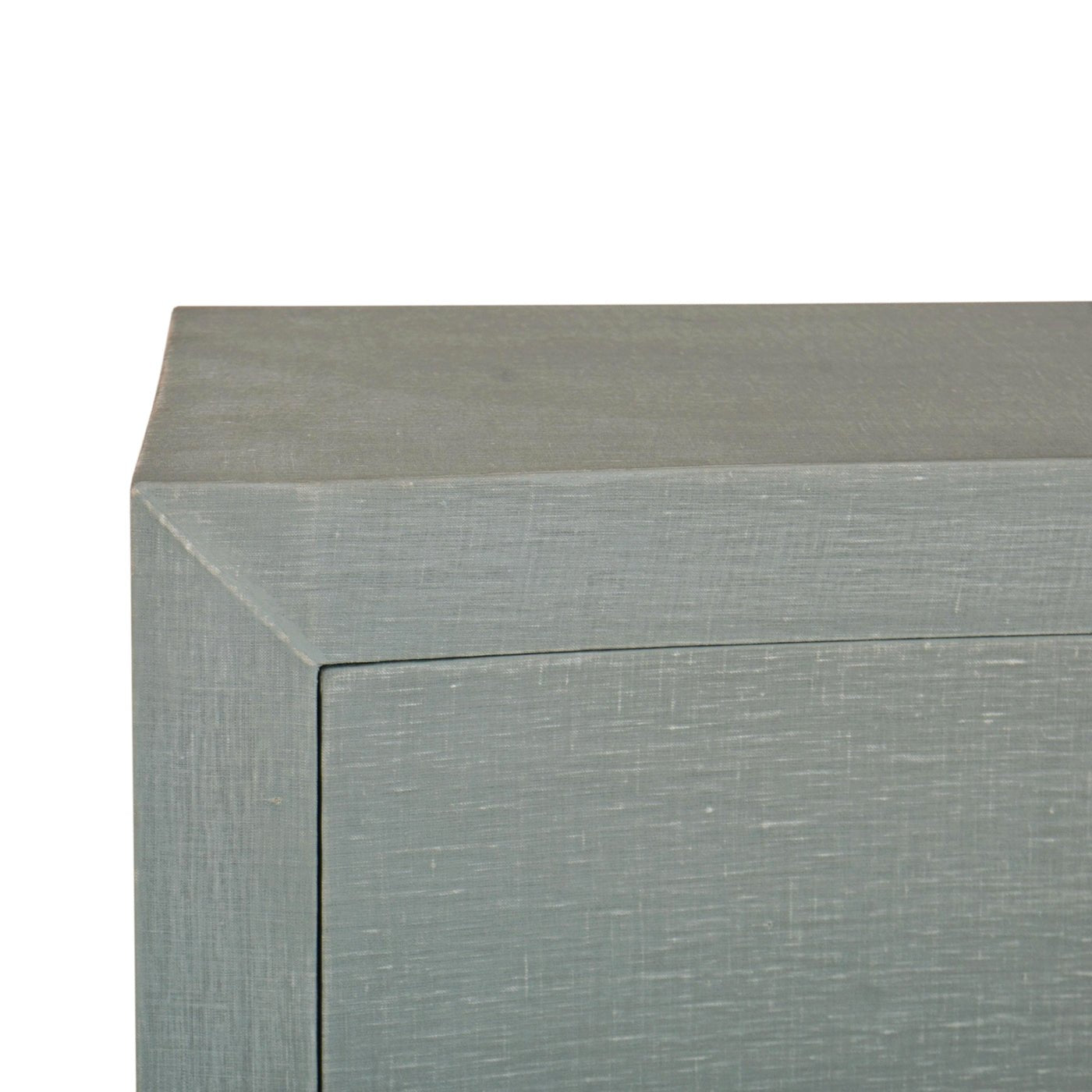 Corner detail of pale blue dresser.