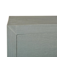 Corner detail of pale blue dresser.