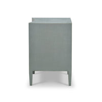 Side view of pale blue nightstand with textured finish.