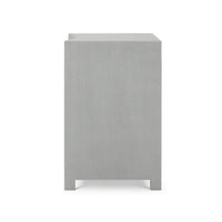 Side view pale blue linen nightstand.