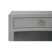 Close-up top drawer pale blue nightstand.