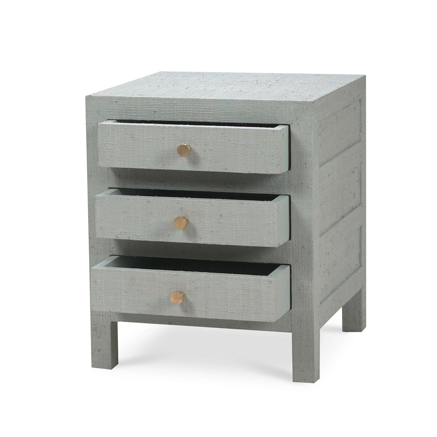 Bedside table, partially open drawers, pale blue raffia.