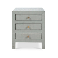 Front view of pale blue bedside table, closed drawers.