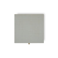 Top view of square raffia nightstand.